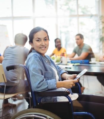 handicapped-business-executive-using-digital-tablet_1170-1845